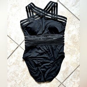 Black one piece bathing suit, barely worn